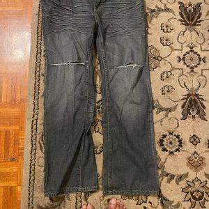 Marc Ecko Boot cut denim jeans purposely slit at knee level. Size 34x30